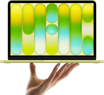 MacBook Neo color amarillo cítrico, sostenida en equilibrio en la punta de los dedos de una mano abierta, la pantalla muestra un patrón abstracto y colorido